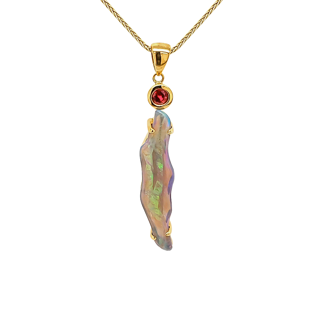 BLACK LIGHTENING RIDGE OPAL AND RUBY PENDANT